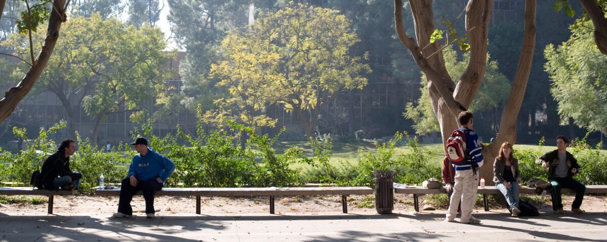 Two students sitting on a bench